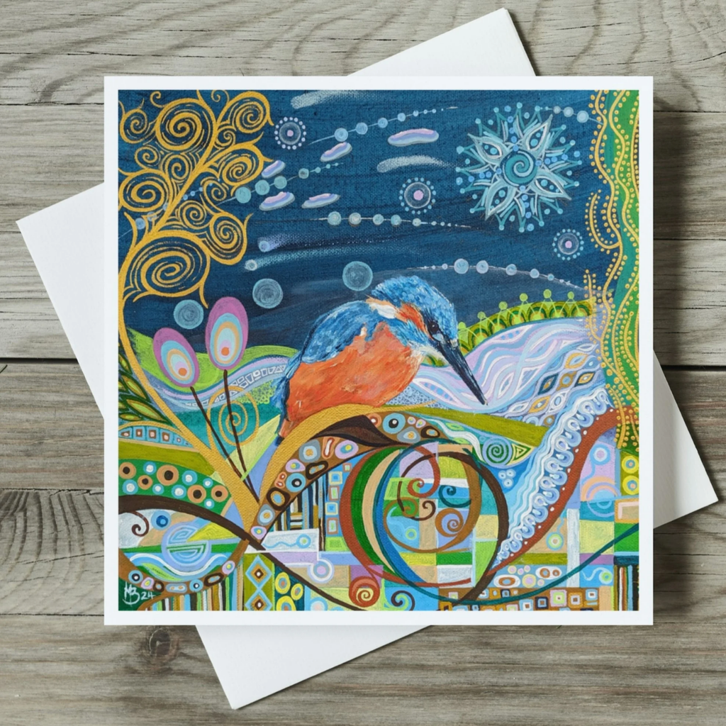 Colourful abstract art card with a kingfisher bird design on a wooden surface
