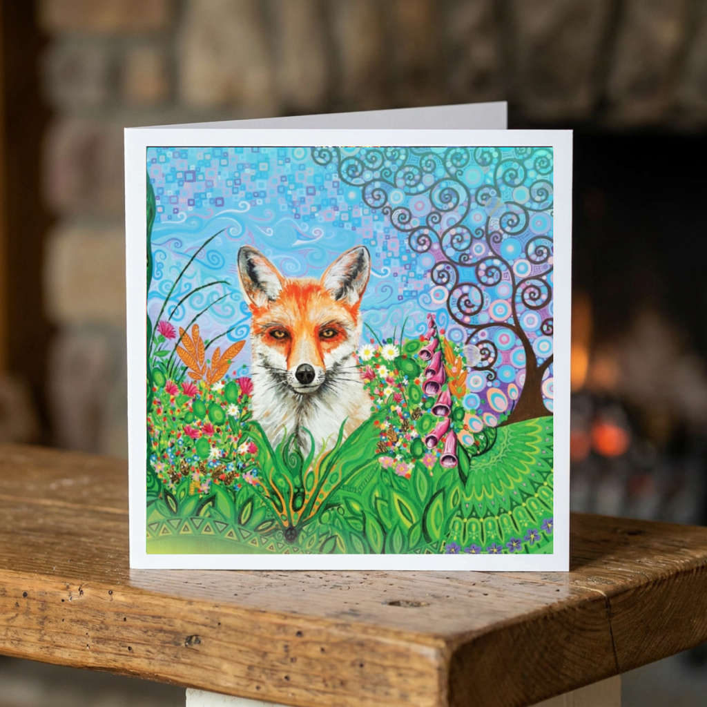 Greeting card with a fox illustration on a wooden surface