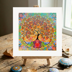 Colourful abstract artwork of a tree with a heart at its base on a wooden easel.