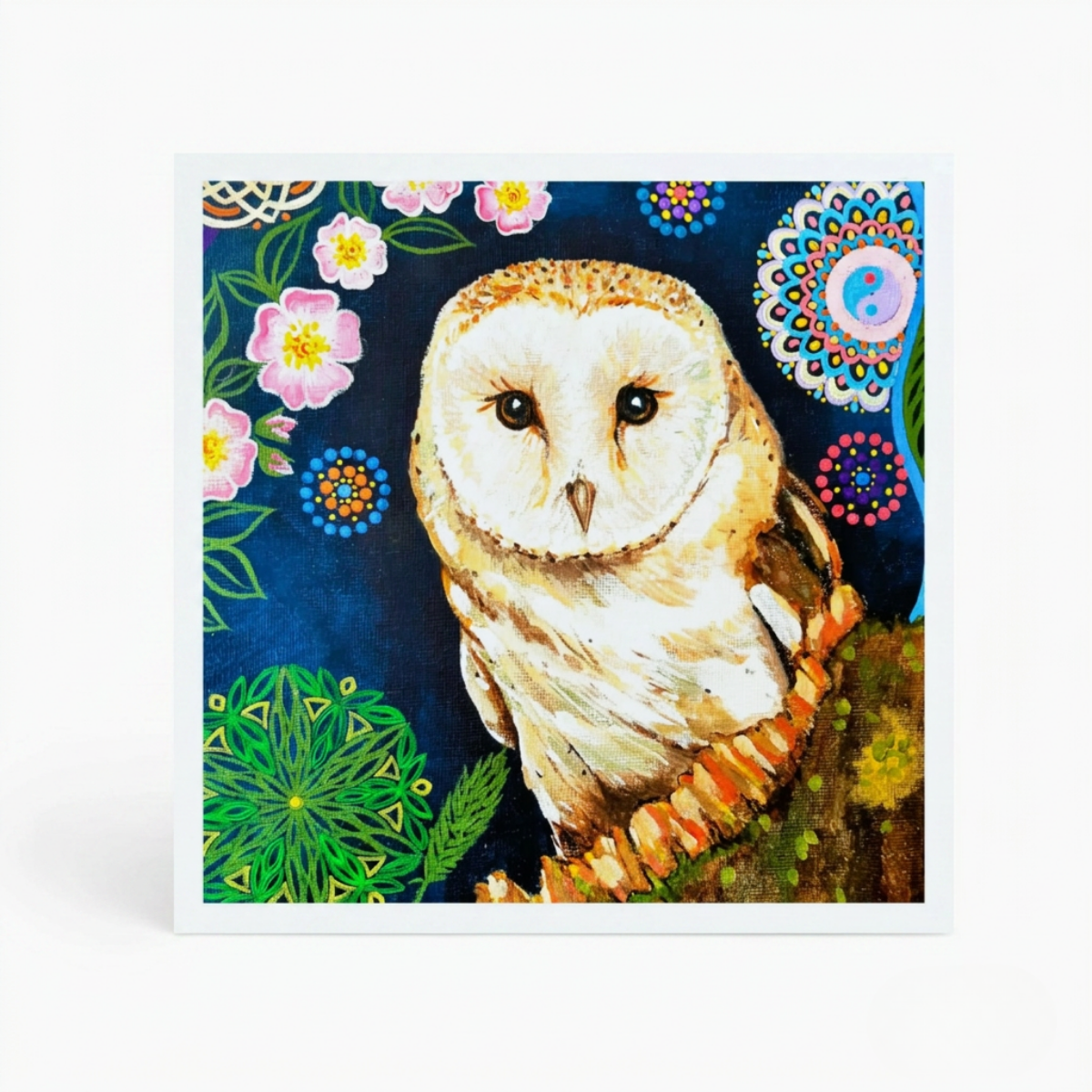 Painting of an owl with floral and geometric designs on a blue background