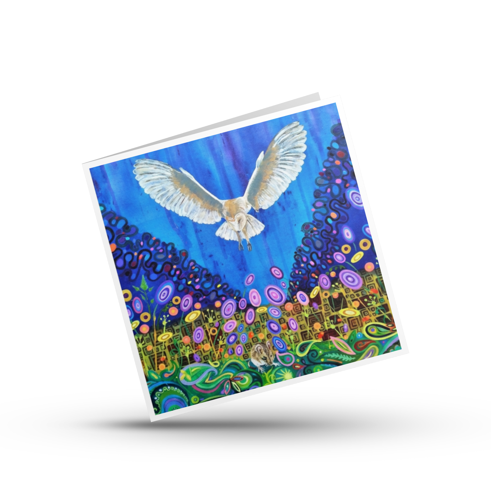 Colourful greeting card with a barn owl bird flying over a mouse in a  stylized landscape on a white background by Mark Betson Artist