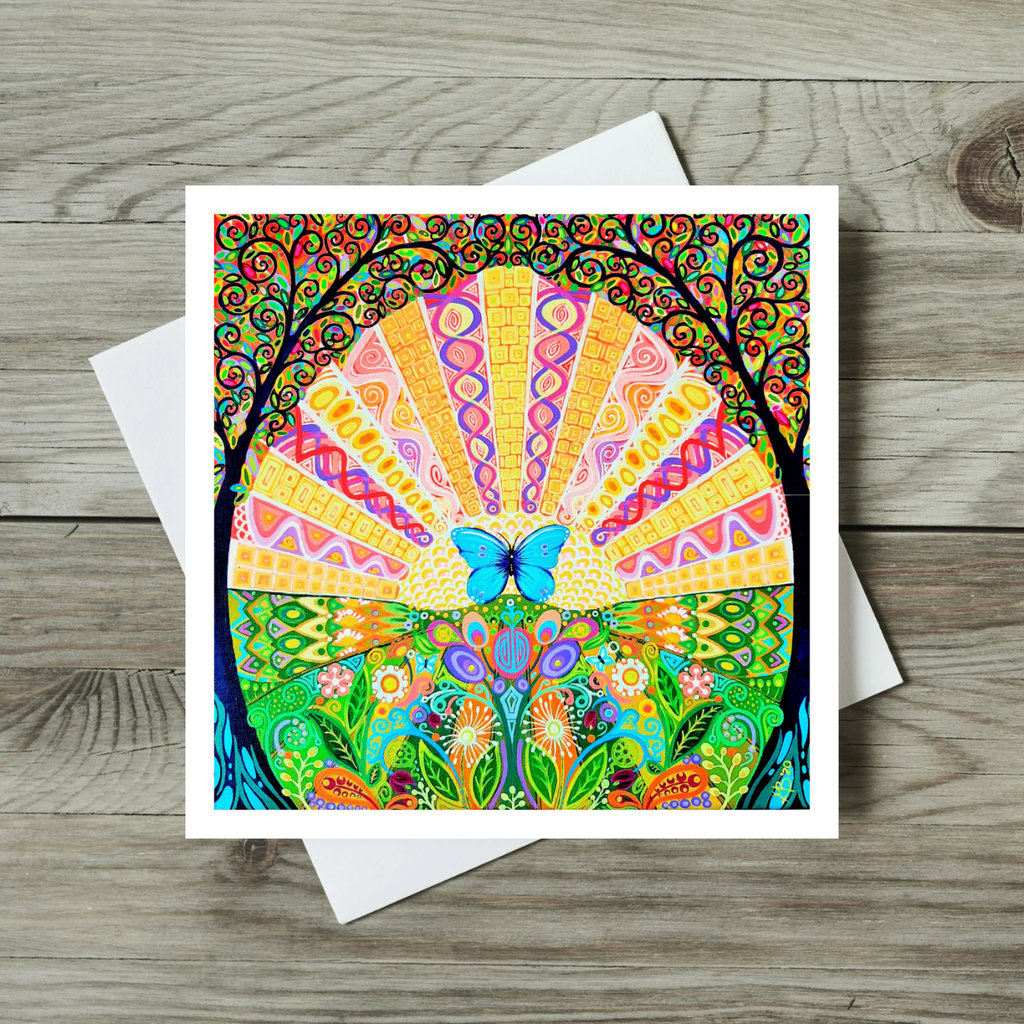Colourful card with a butterfly design on a wooden surface