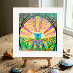 Colourful abstract artwork with a butterfly on a wooden surface
