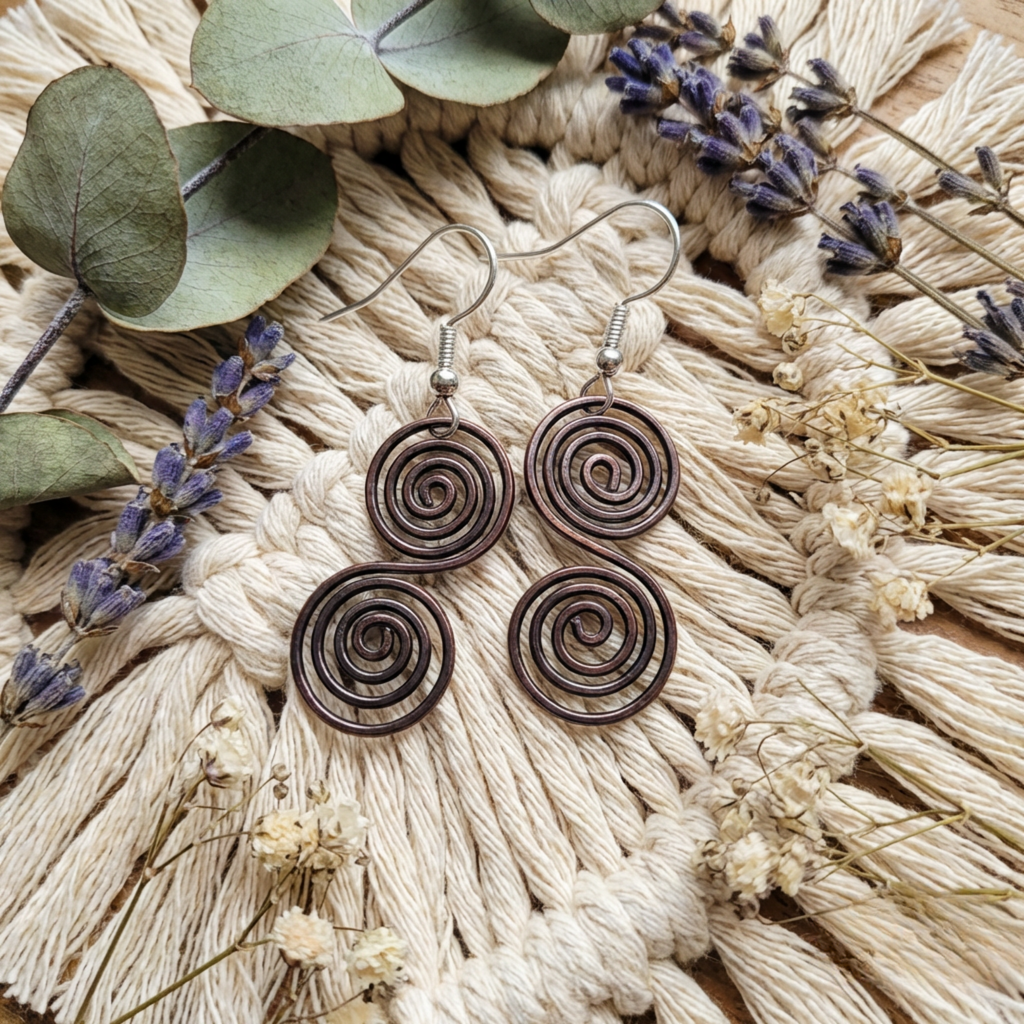 Celtic copper spiral earrings, rustic handmade jewellery UK