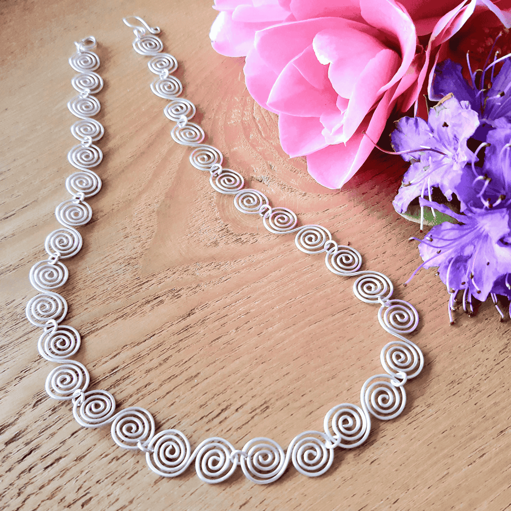 Handmade silver spiral necklace with S shaped spirals