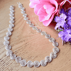 Handmade silver spiral necklace with S shaped spirals