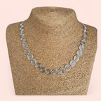 Straw mannequin wearing a Celtic Silver Spiral Necklace