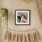 Framed artwork of a colourful woman on a wall with decorative elements.