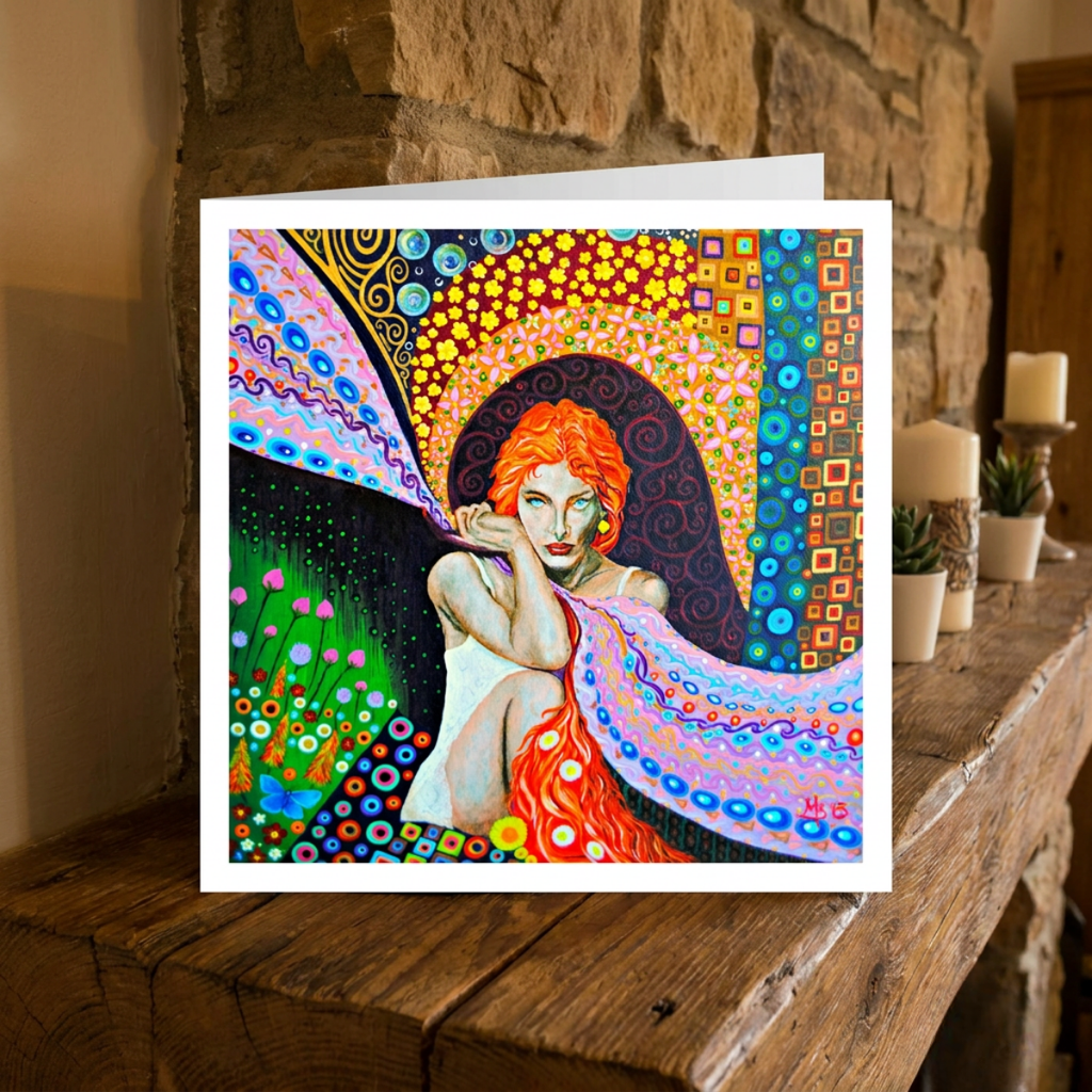 Colourful artwork of a woman with red hair on a wooden surface.