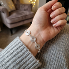 model showing the silver spiral bracelet