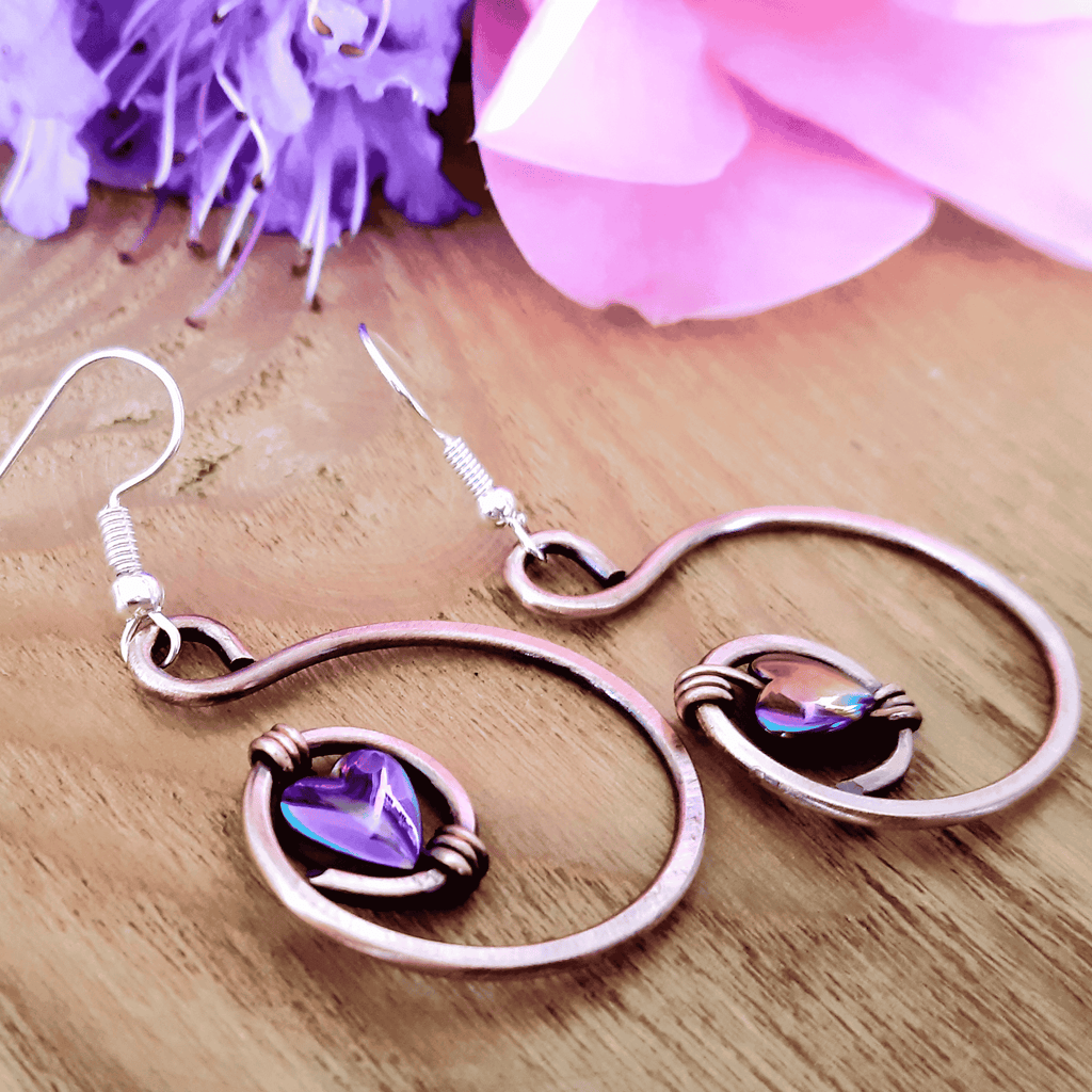 Rainbow hematite heart hoop copper earrings close-up detail, iridescent hematite heart handmade UK