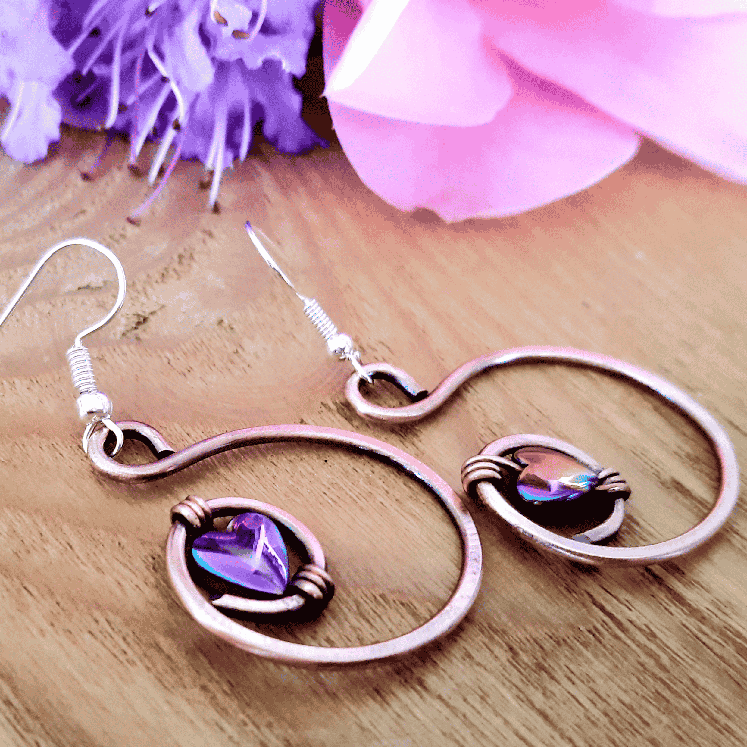 Rainbow hematite heart hoop copper earrings close-up detail, iridescent hematite heart handmade UK