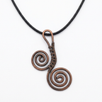 Necklace with spiral pendant on a white background