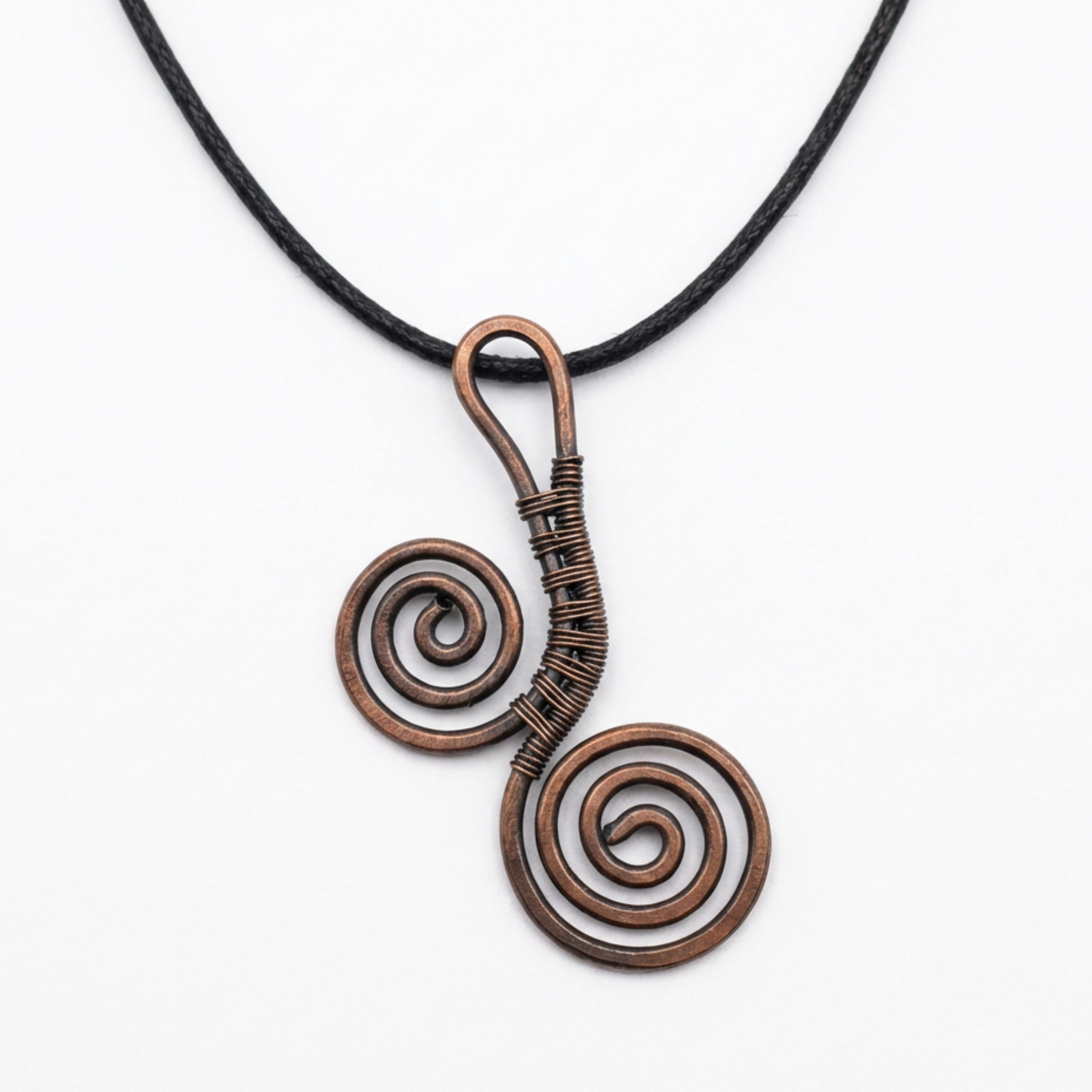 Necklace with spiral pendant on a white background