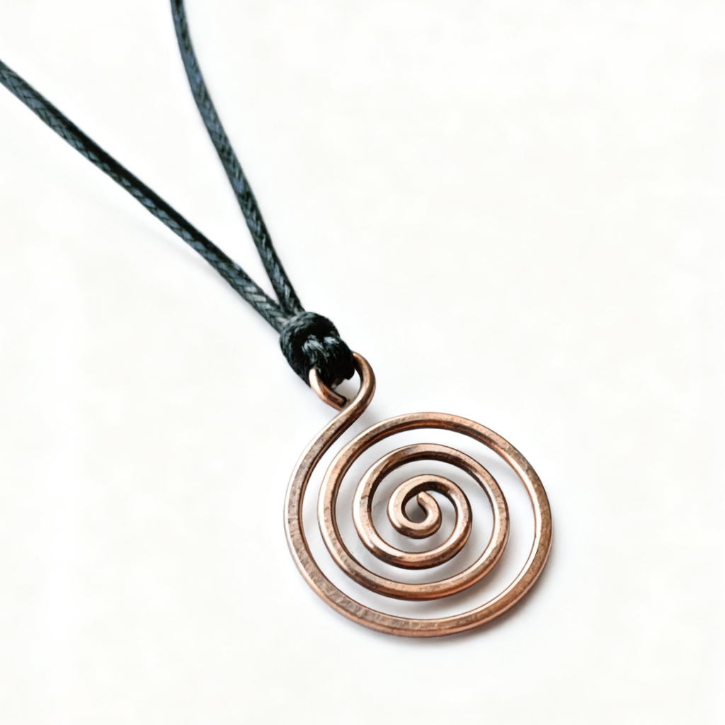 Necklace with a spiral pendant on a white background
