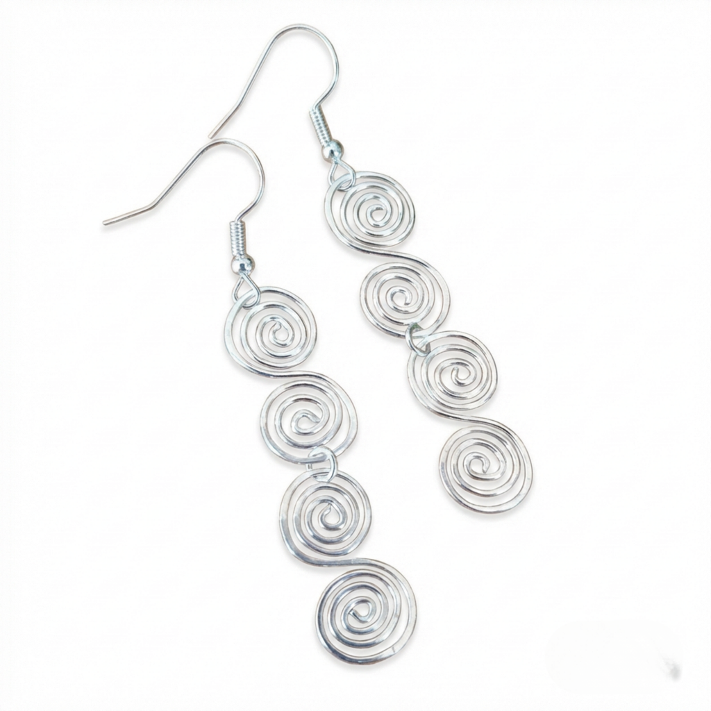 Silver spiral earrings on a white background