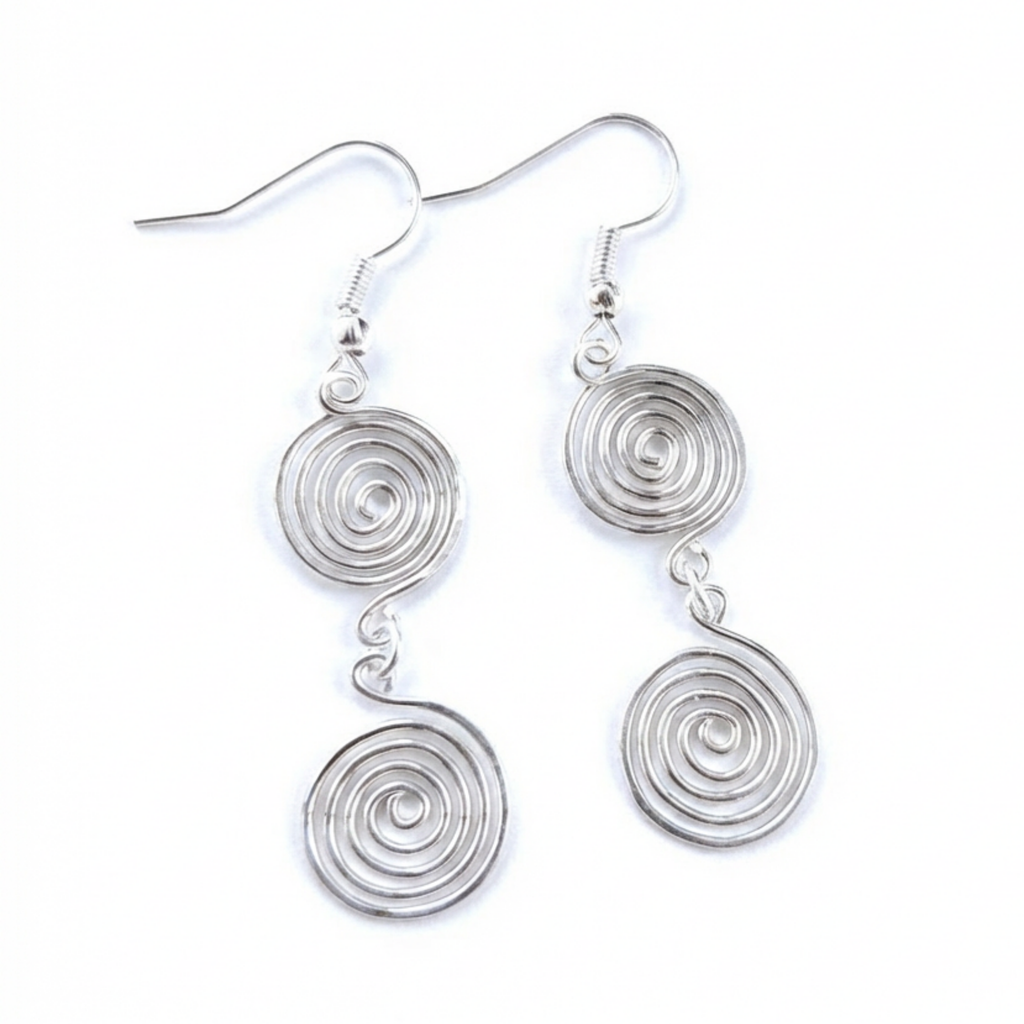 Silver spiral earrings on a white background