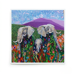 Colourful painting of three elephants in a field with flowers and mountains.