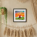 Framed colorful artwork of a tree on a wall with decorative elements.