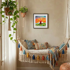 Decorative indoor swing with colorful pillows and a framed artwork on the wall.