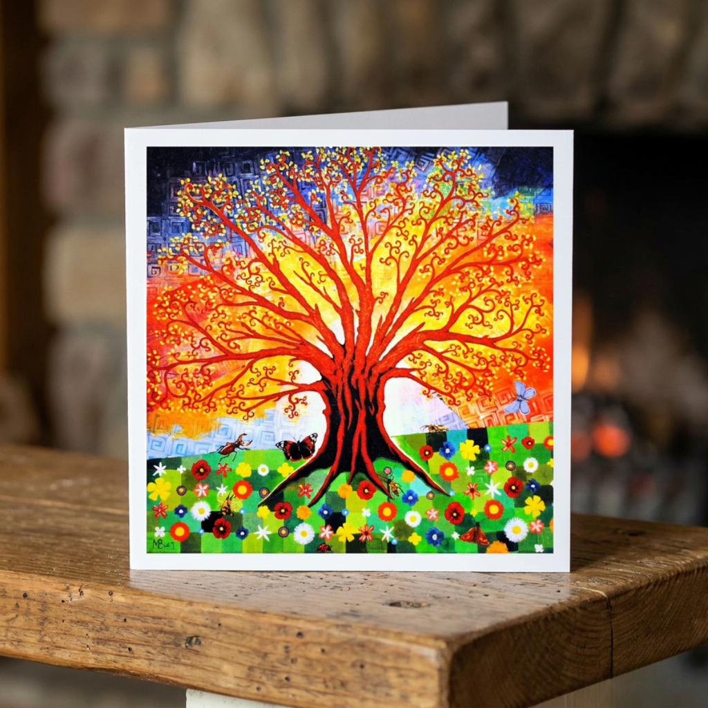 Colourful greeting card with a tree design on a wooden surface