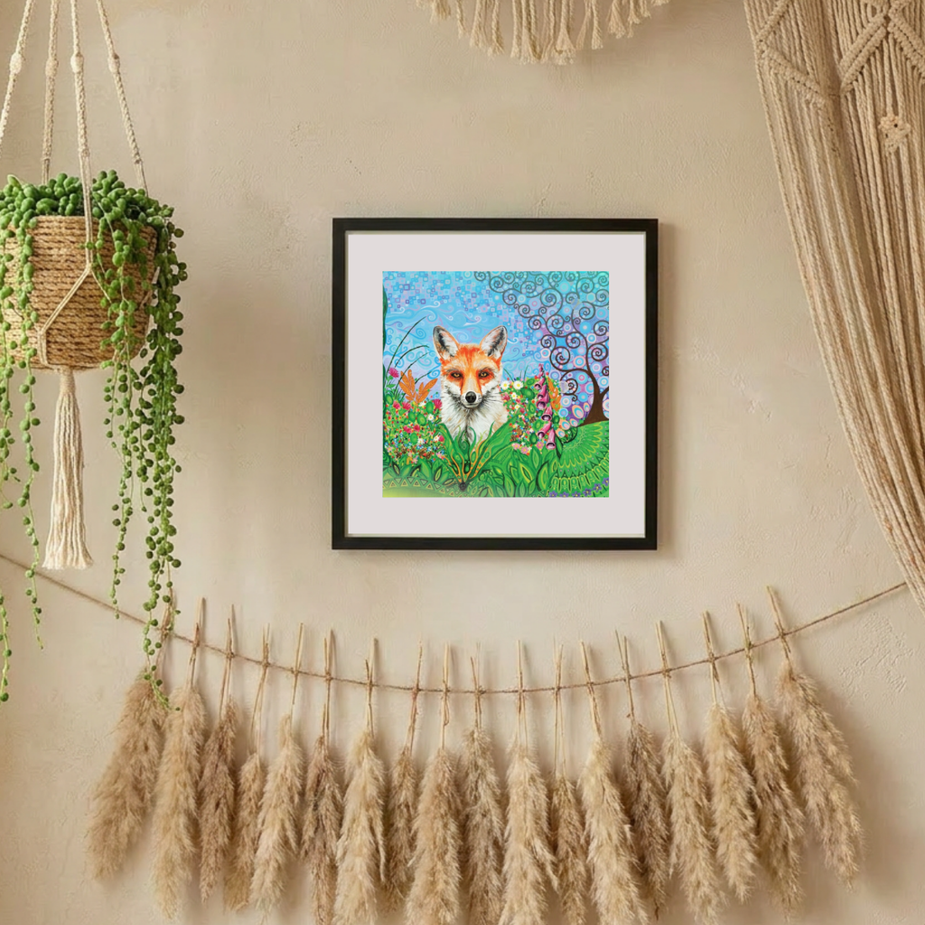 Framed artwork of a fox in a garden with decorative elements on a wall.