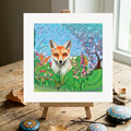 Colourful painting of a fox in a garden on a wooden easel.
