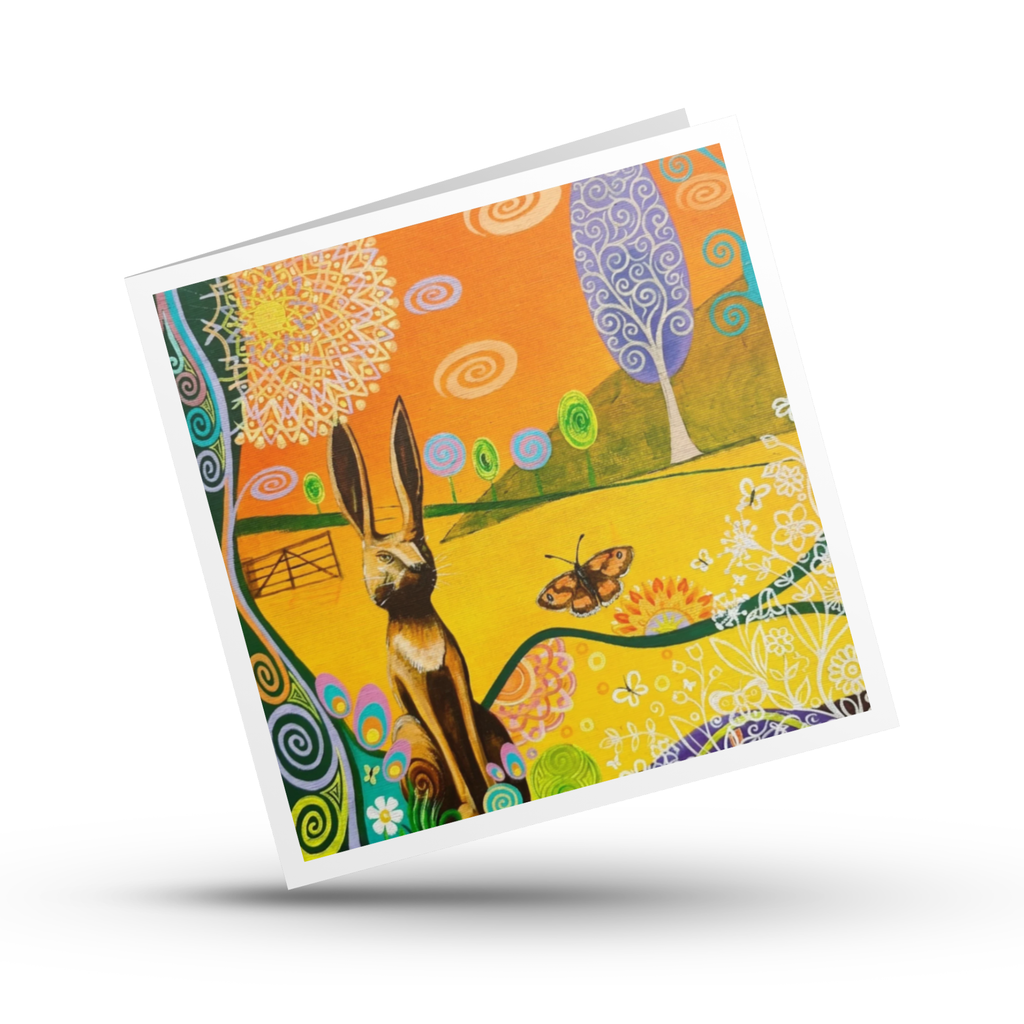 Wooden sculpted Hare Gatekeeping the Landscape with spiral trees orange greeting card on white background