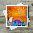 Colorful greeting card with abstract design on a wooden surface