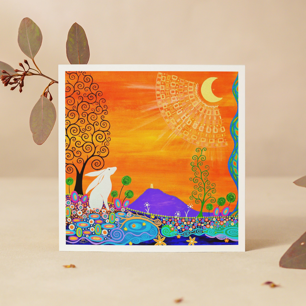 Colourful abstract artwork with a hare, trees, and mountains on a beige background