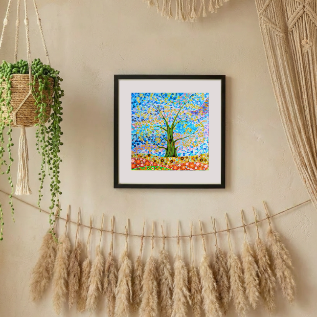 Framed colourful artwork of a tree of life and flowers on a wall with decorative elements.