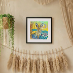 Framed artwork of a rabbit with a colourful abstract background on a wall with decorative elements.