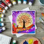 Colourful painting of a tree with animals on a wooden surface with art supplies.