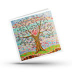 Colourful greeting card with a tree of life and heart design on a white background