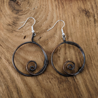 Hoop copper spiral earrings close-up detail, overlapping wire hoop spiral design handmade UK