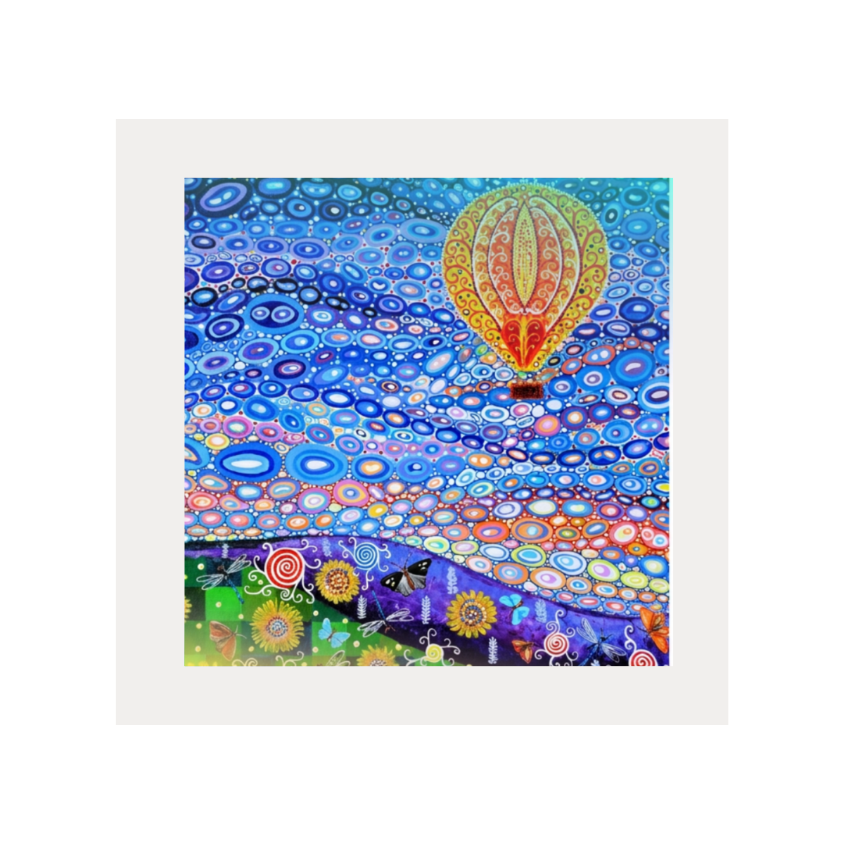 Colourful abstract artwork with a hot air balloon and circular patterns on a white background