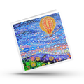 Colourful greeting card with a hot air balloon design on a white background