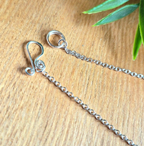 Detailed view of the fish hook clasp and chain