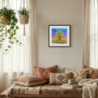 Living room with a colourful abstract painting on the wall, patterned cushions, and plants.