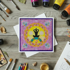 Colourful card with yoga pose design on a wooden surface with art supplies.