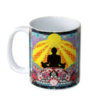 Mug with a colorful design featuring a silhouette of a person in meditation and floral patterns on a white background.