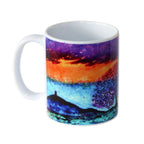 Mug with a colourful design of a landscape and abstract patterns on a white background