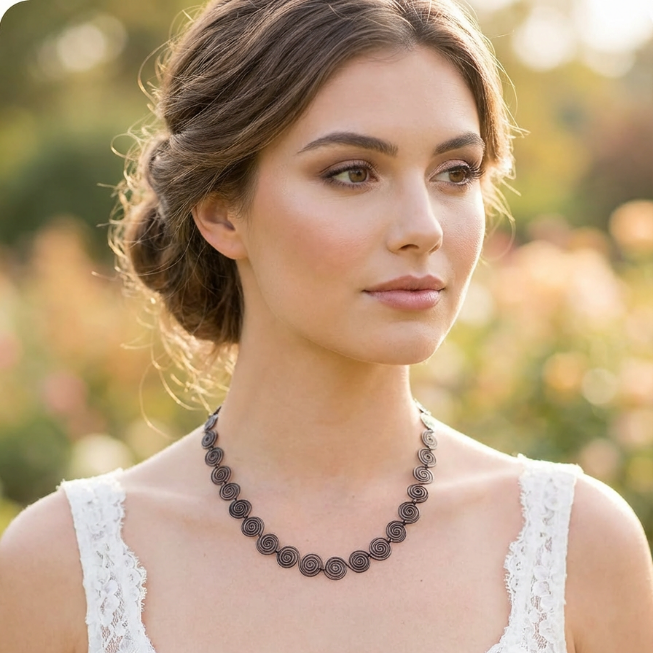 Woman wearing a earthy copper necklace with a blurred natural background