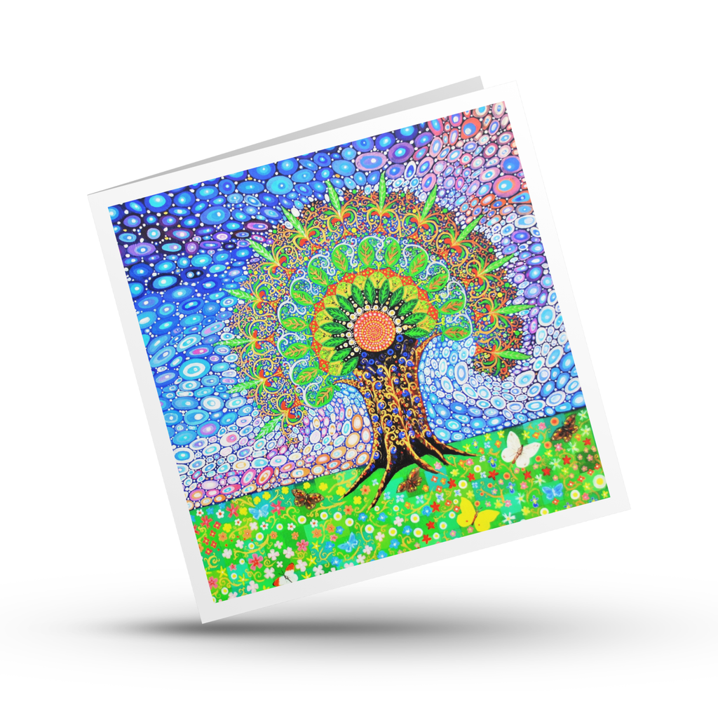 Colourful mandala of a tree of Life design on a greeting card with a  white background