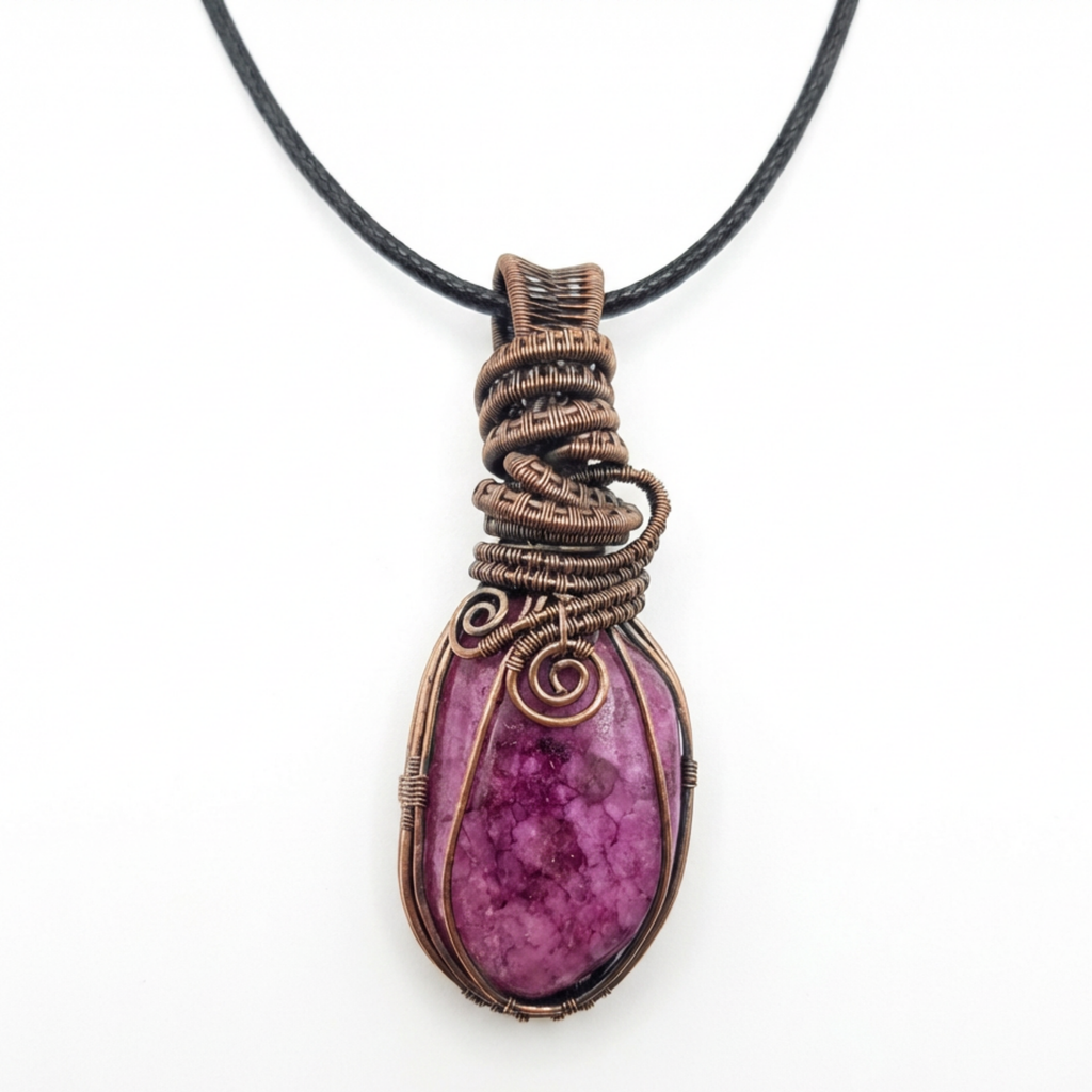Necklace with a purple stone pendant on a white background