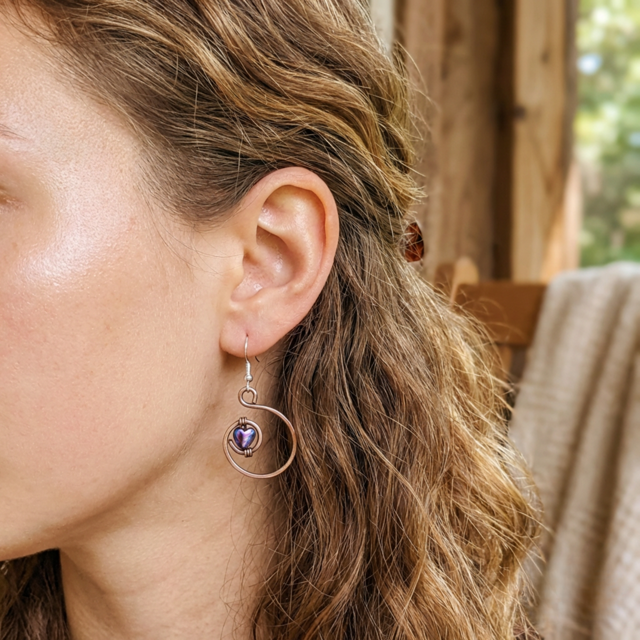 Rainbow hematite heart hoop copper earrings flat lay, oxidised copper gemstone earrings UK