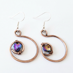 Rainbow hematite heart hoop copper earrings worn by model, rustic handmade jewellery UK