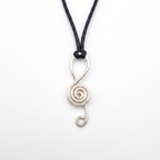 Silver spiral pendant on a black cord against a white background