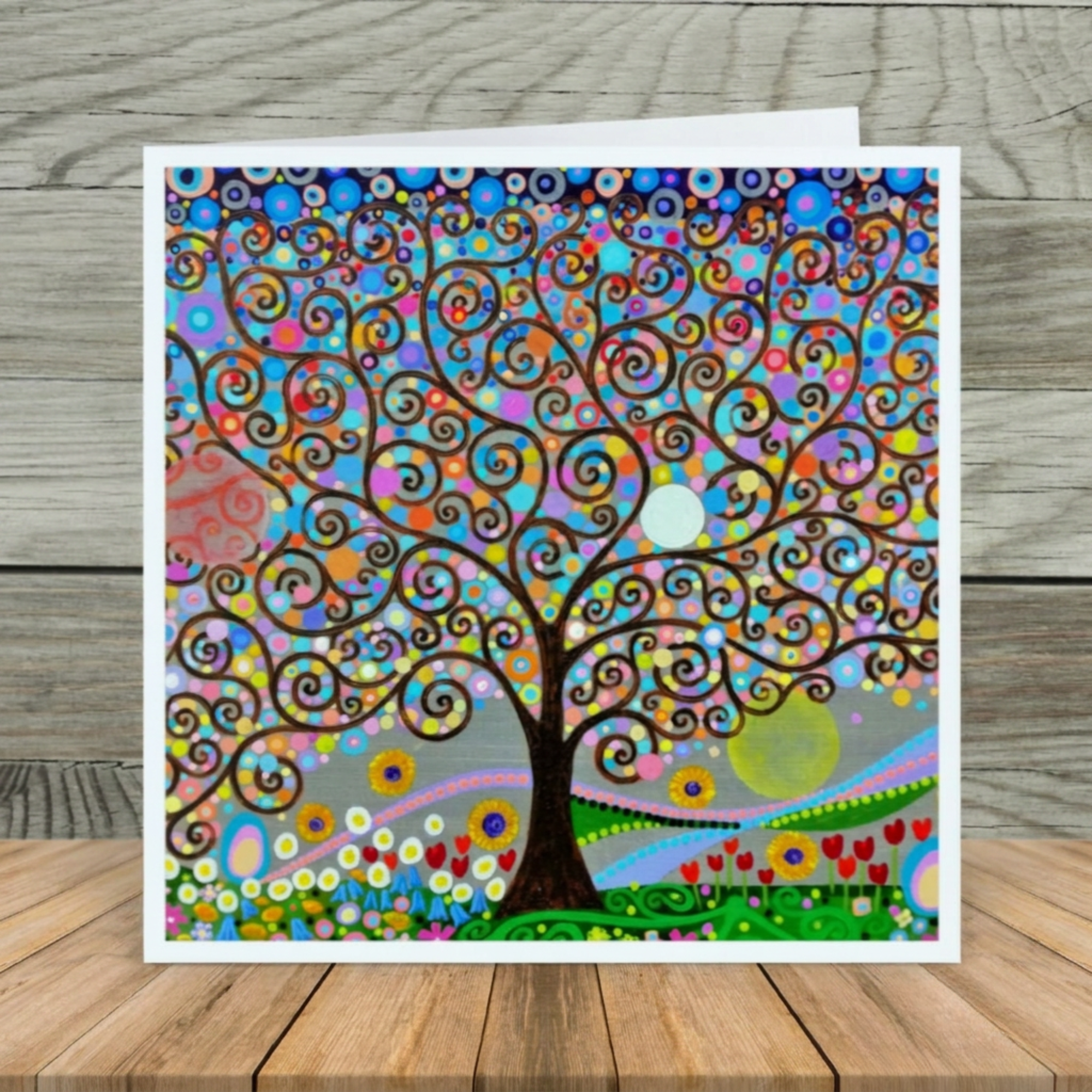 Colourful abstract tree design on a wooden surface