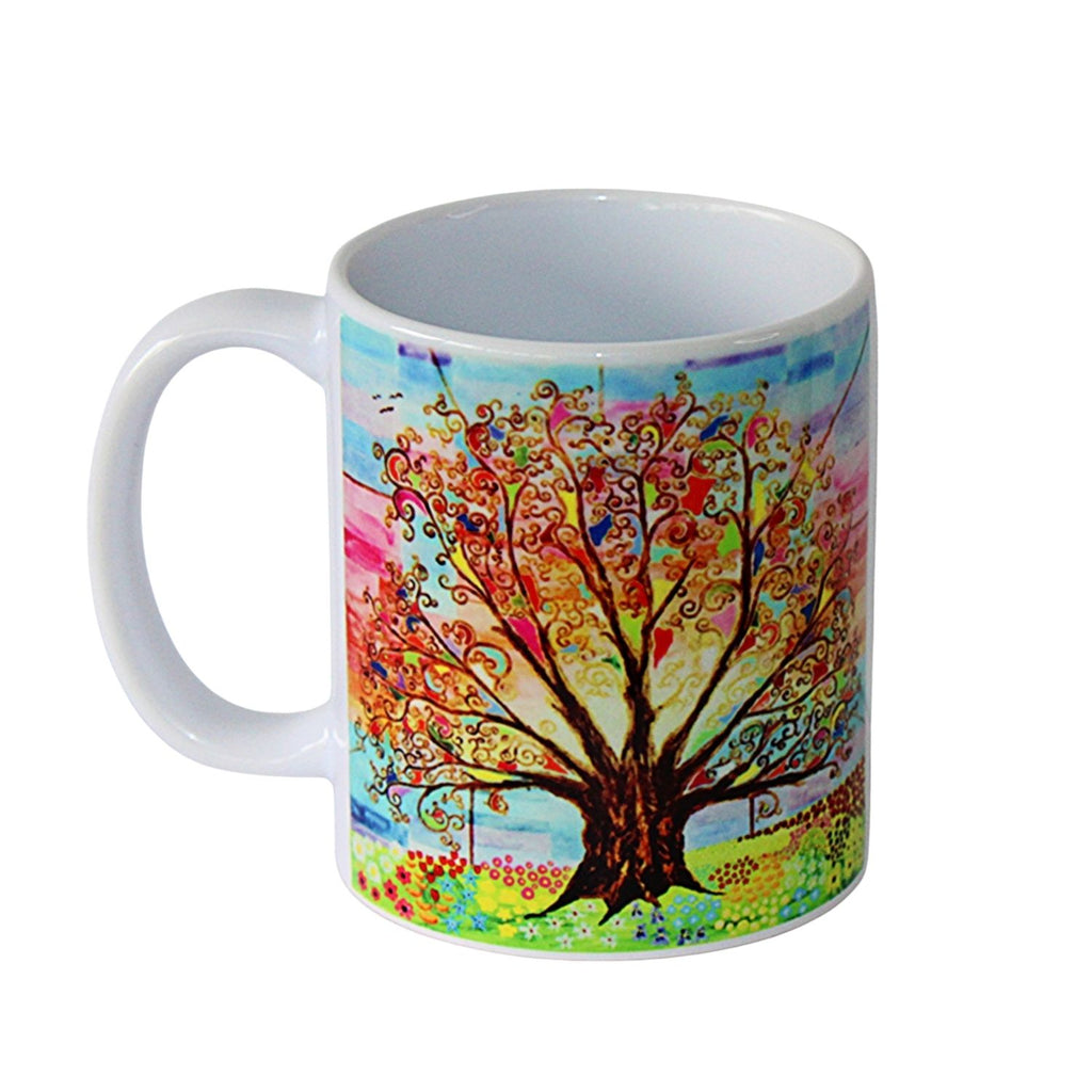 Colourful mug with a tree of life design on a white background